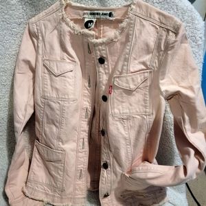 Levi's Jean jacket Pink Size Med Like new. Runs small. Form fit. Raw hems